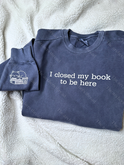 I closed my book to be here